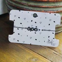 Afbeelding in Gallery-weergave laden, Armbandje XXX Zwart wit Lieflabel AAAndacht